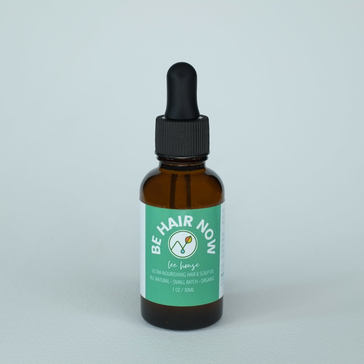 an amber dropper bottle on a white background, the label reads "be hair now" ultra nourishing hair and scalp oil by leehouse.