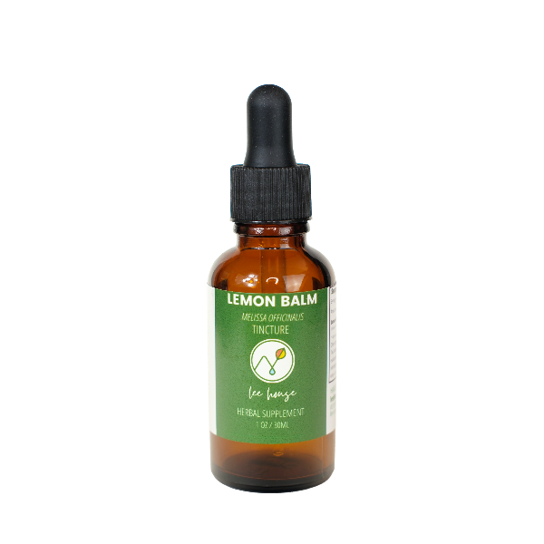 LeeHouse small batch lemon balm tincture with a dropper on a white background