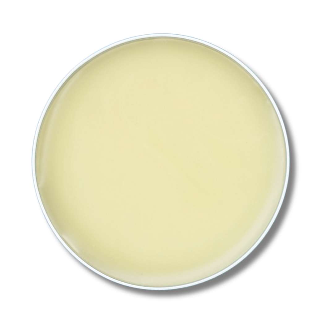 Round container of beige cream on a white background