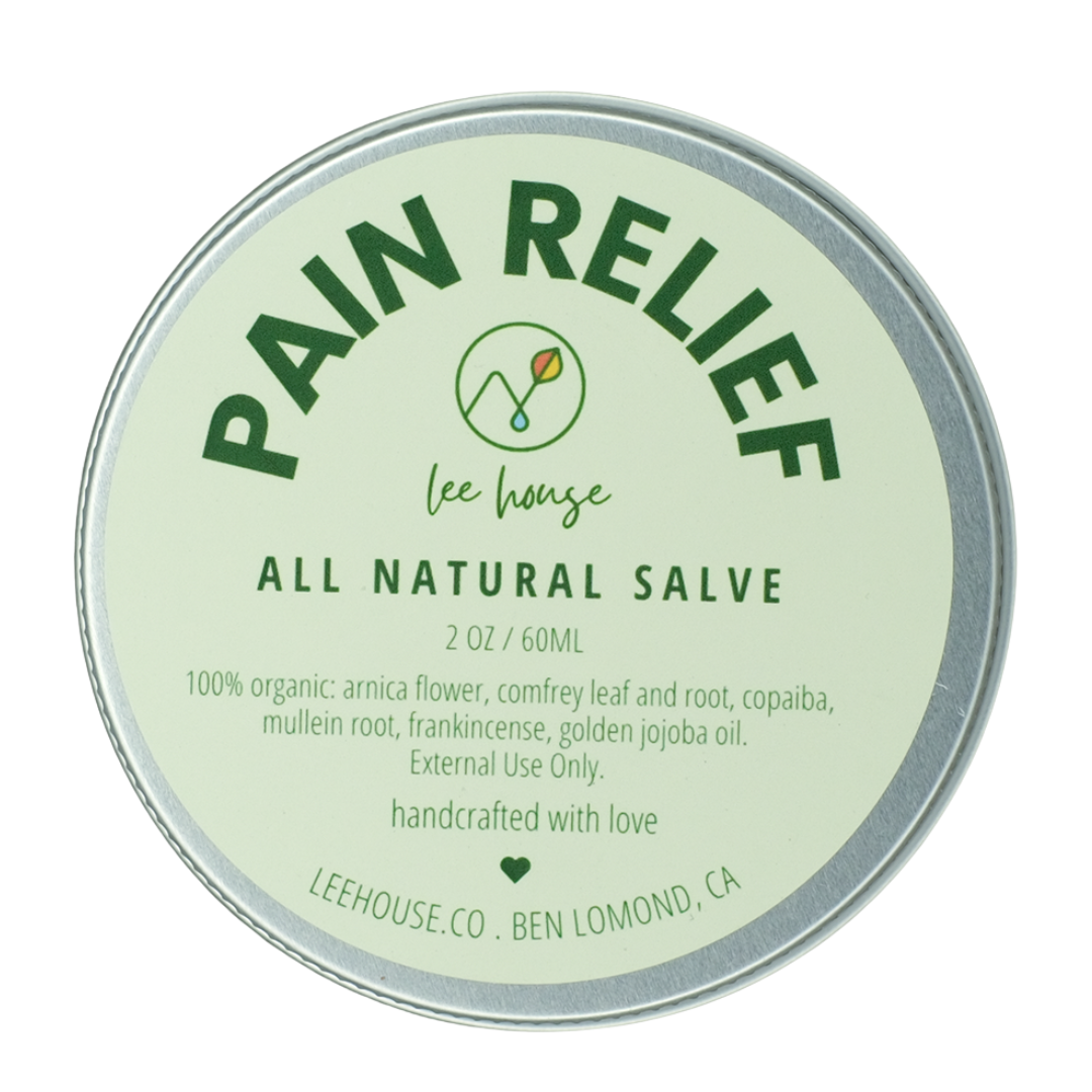 All natural salve container labeled 'Rain Relief' with branding details on a white background