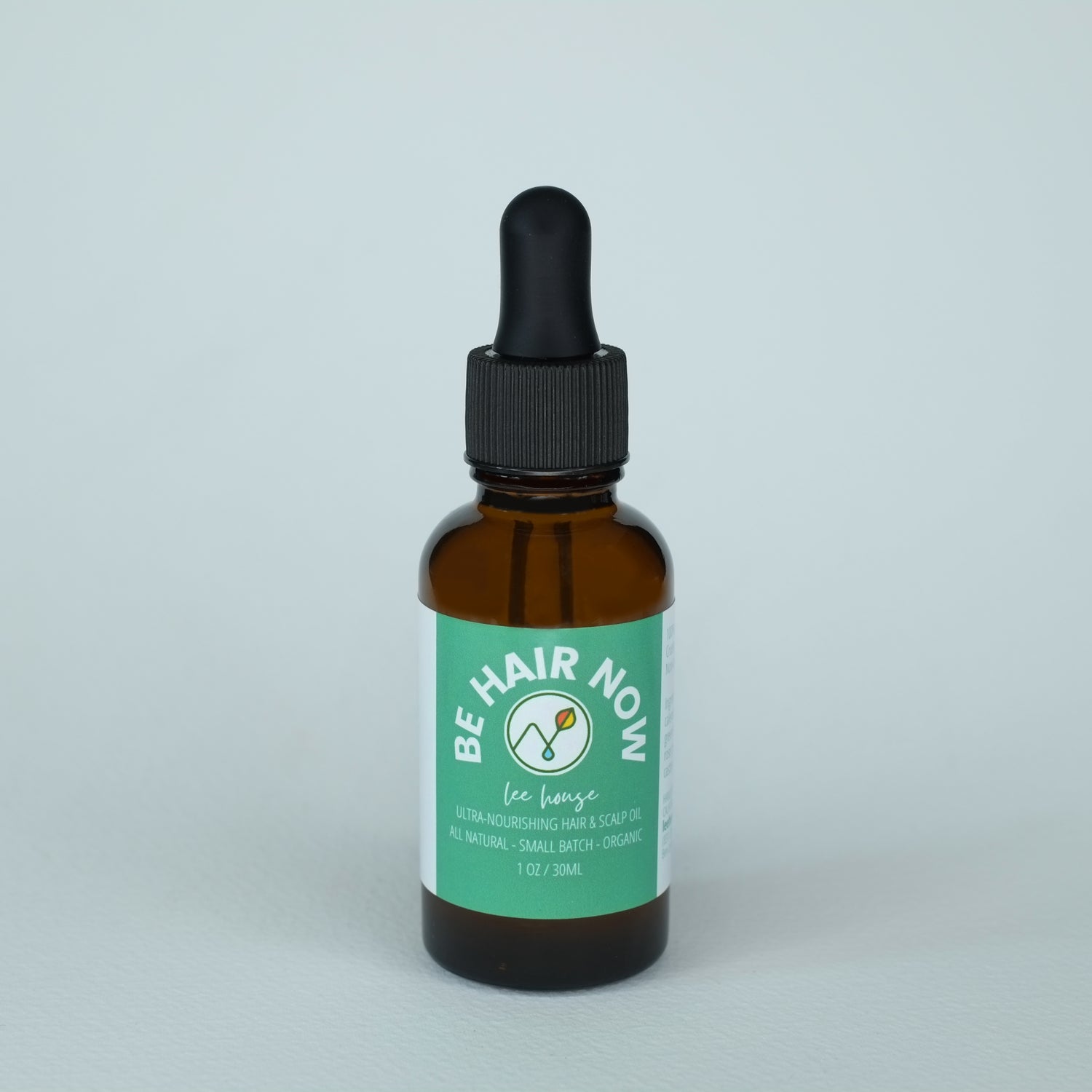 an amber dropper bottle on a white background, the label reads "be hair now" ultra nourishing hair and scalp oil by leehouse.