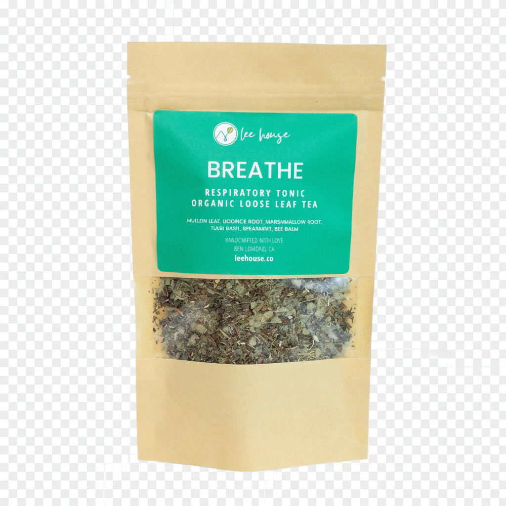 Tea package labeled 'Breathe' with a clear window showing tea leaves on a light blue background
