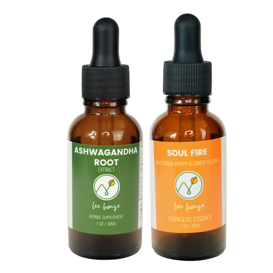Two bottles of 'Ashwagandha Root' and 'Soul Fire' on a white background